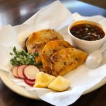 Birria tacos, a traditional Mexican dish featuring shredded, stewed meat served in soft corn tortillas